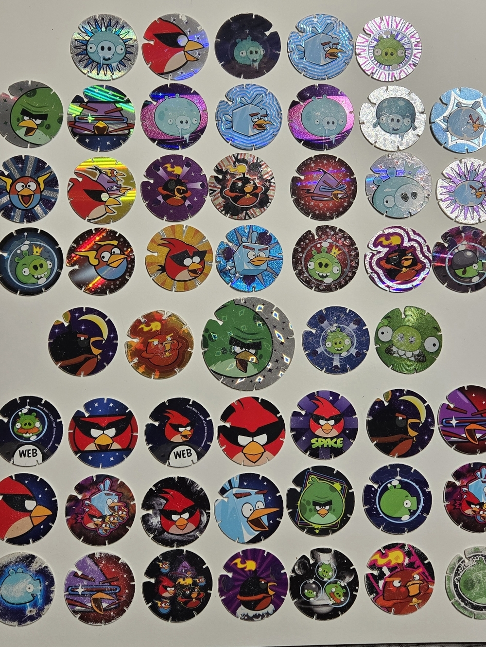 Lot of 52 vintage Angry Birds Tazos pogs or caps mostly good condition minor fla